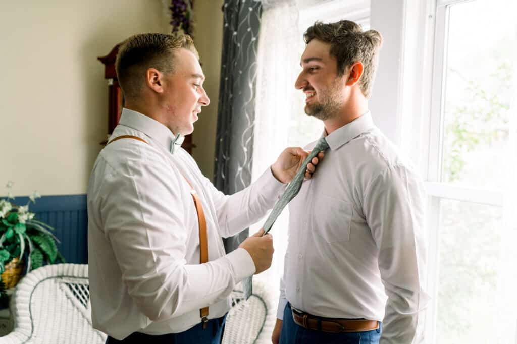 groom getting ready with best man