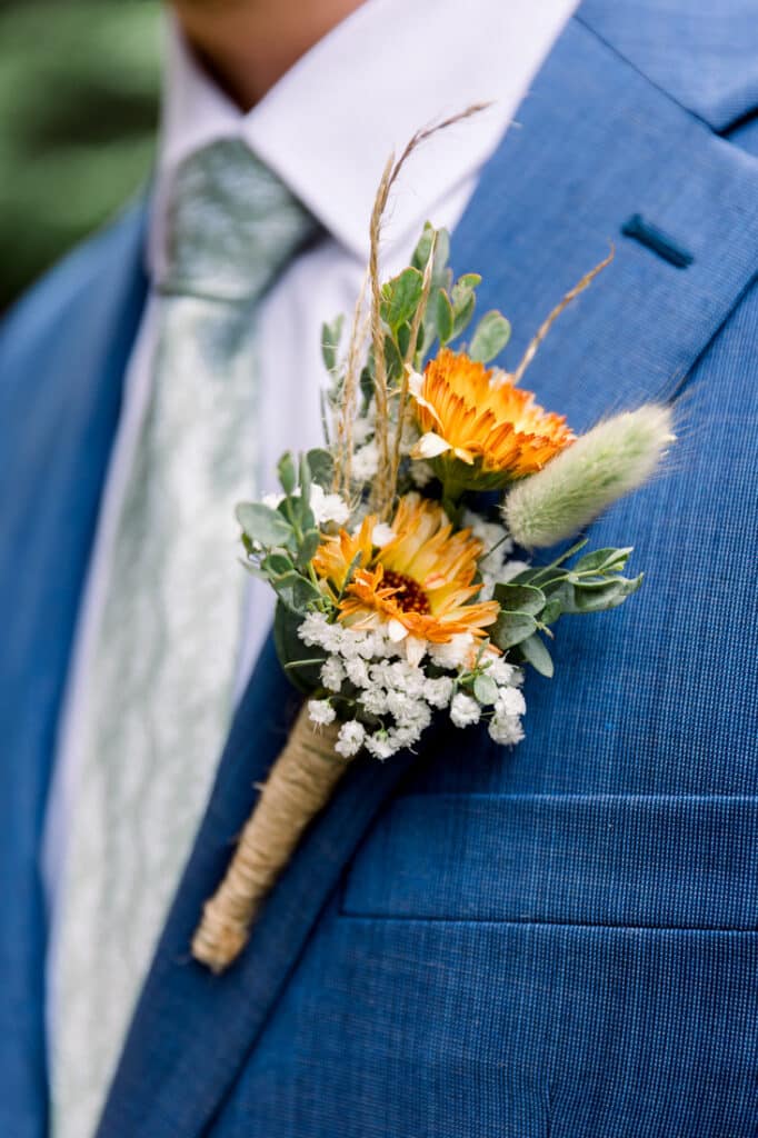 mohawk falls groom boutonniere