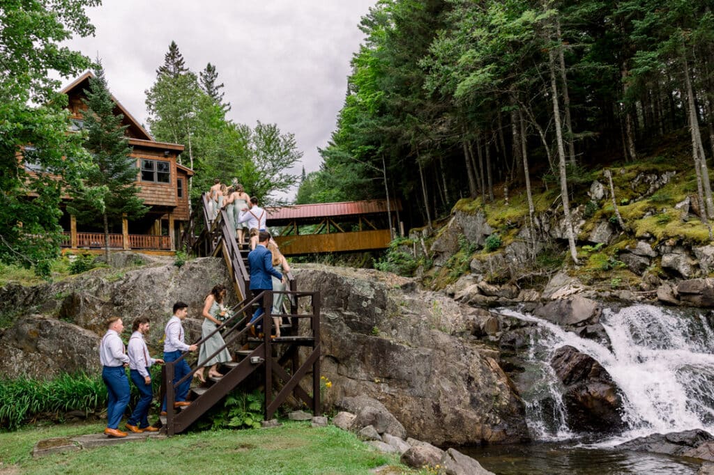 mohawk falls wedding party on stairs next to waterfall