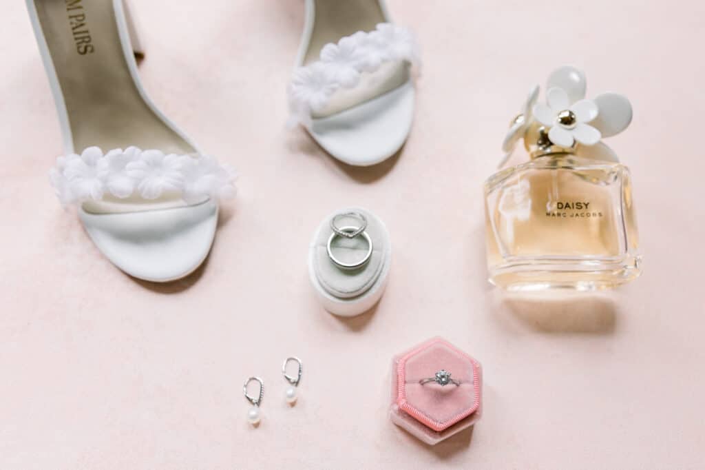 pink daisy wedding flatlay