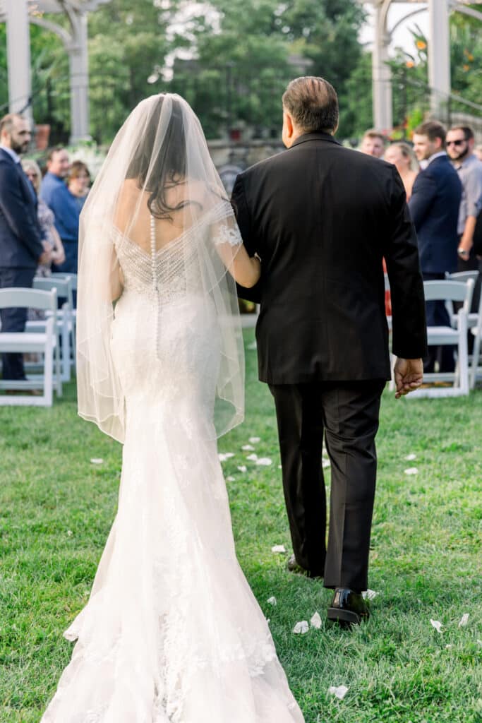 tower hill bride walking down aisle