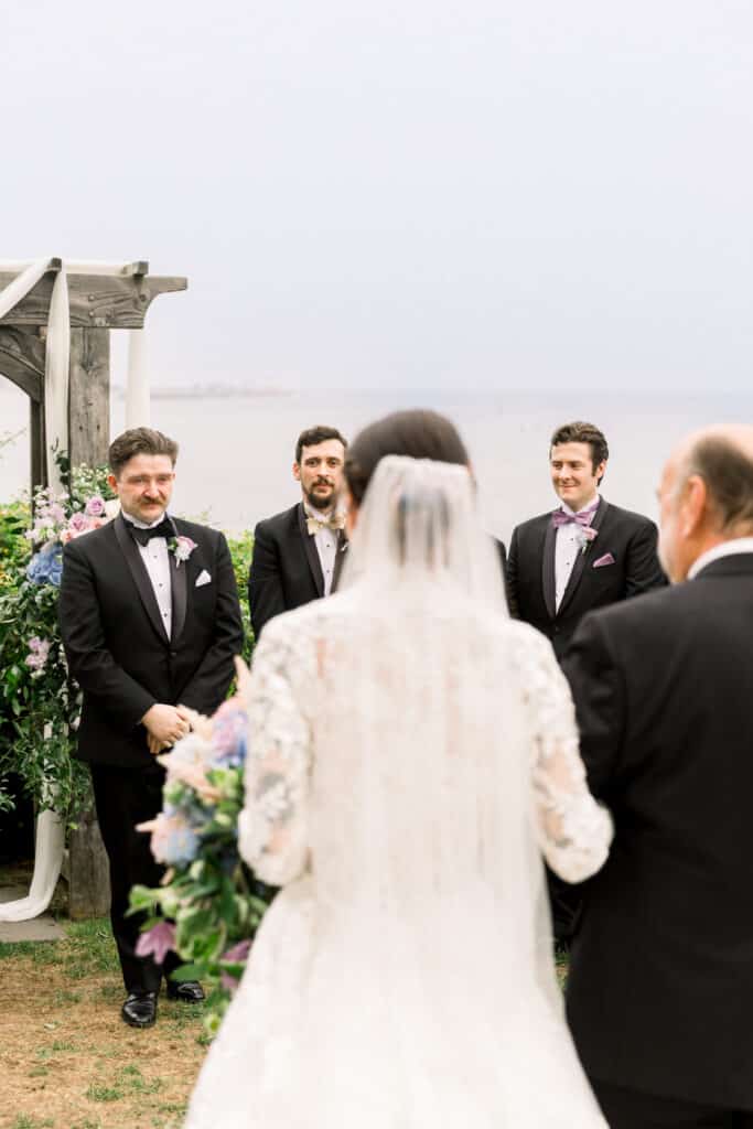 Groom Seeing Bride Walking Down Aisle