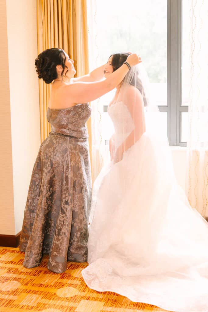 Great River Golf Club Bride Getting Into Veil